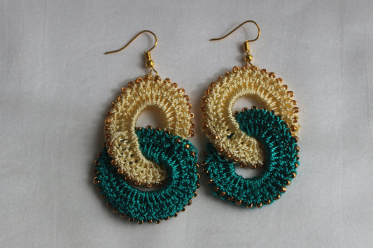 Handcrafted teal and champagne gold crochet knot earrings with gold seed bead accents, lightweight boho statement earrings for women.